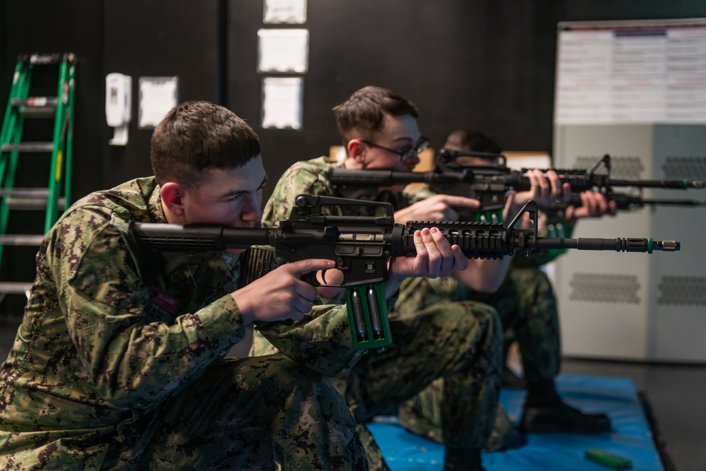 New Accession Sailors Conduct Weapons Training