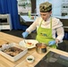 Navy Culinary Specialist provides cooking demo at PA Farm Show