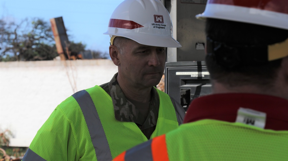 Maj. Gen. William “Butch” Graham U.S. Army Corps of Engineers, Headquarters Deputy Commanding Gen., receives updates on the wildfire recovery mission during a site visit to impacted areas in Lahaina, Hawaii, Jan. 10.