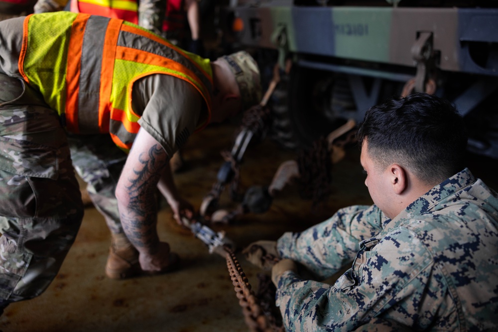 3d LCT loads a Logistics Support Vessel in preparation for Bougainville III