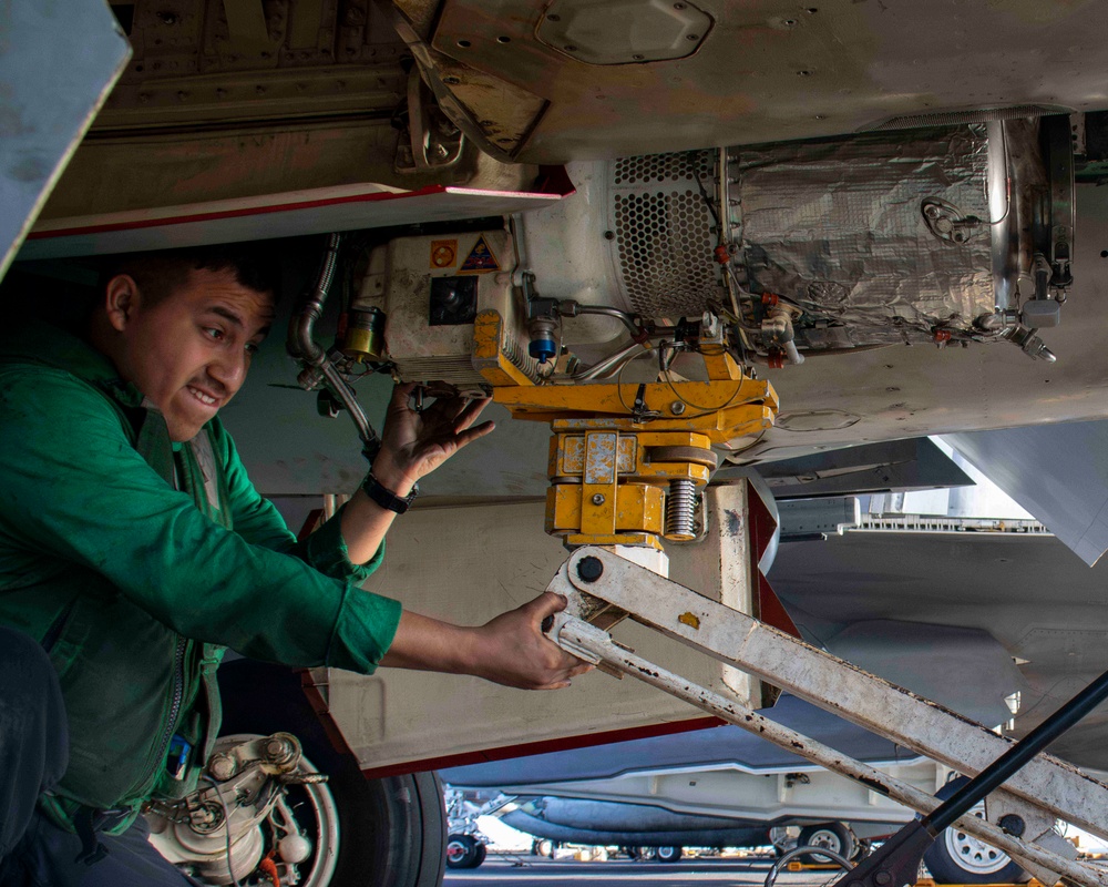 USS Carl Vinson (CVN 70) Sailor Conducts Aircraft Maintenance