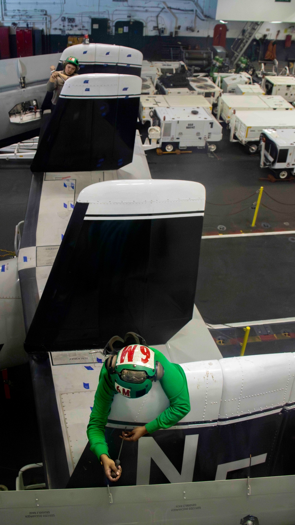 USS Carl Vinson (CVN 70) Sailors Conduct Aircraft Maintenance