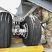 Airman Inspects Landing Gear During Winter Storm at Selfridge Air National Guard Base