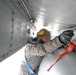 Airman Conducts Preparation for Weapons Loading on A-10C Thunderbolt II During Winter Storm