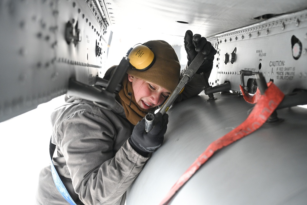 Airman Conducts Preparation for Weapons Loading on A-10C Thunderbolt II During Winter Storm