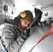 Airman Conducts Preparation for Weapons Loading on A-10C Thunderbolt II During Winter Storm