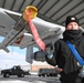 Airman Conducts Weapons Inspection on AIM-9 Sidewinder Missile During Winter Storm