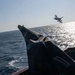 F-16 Fighting Falcon aircraft flies by USS Mason (DDG 87)