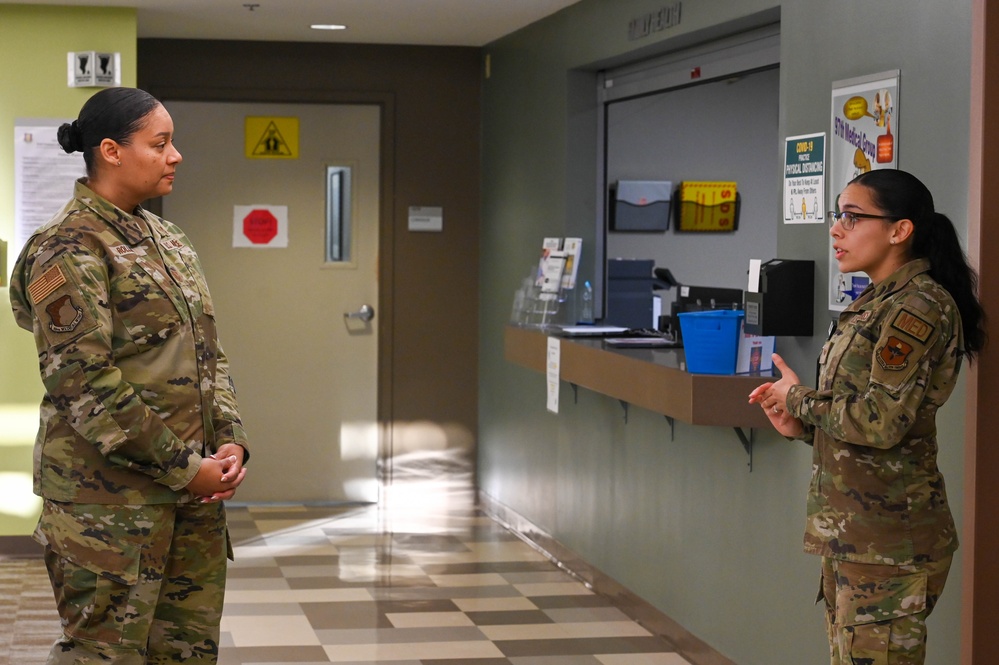 CMSgt. Rollins visits with Airmen from the 97th Medical Group