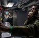 USS Carl Vinson (CVN 70) Sailor Operates Valves In A Catapult Room