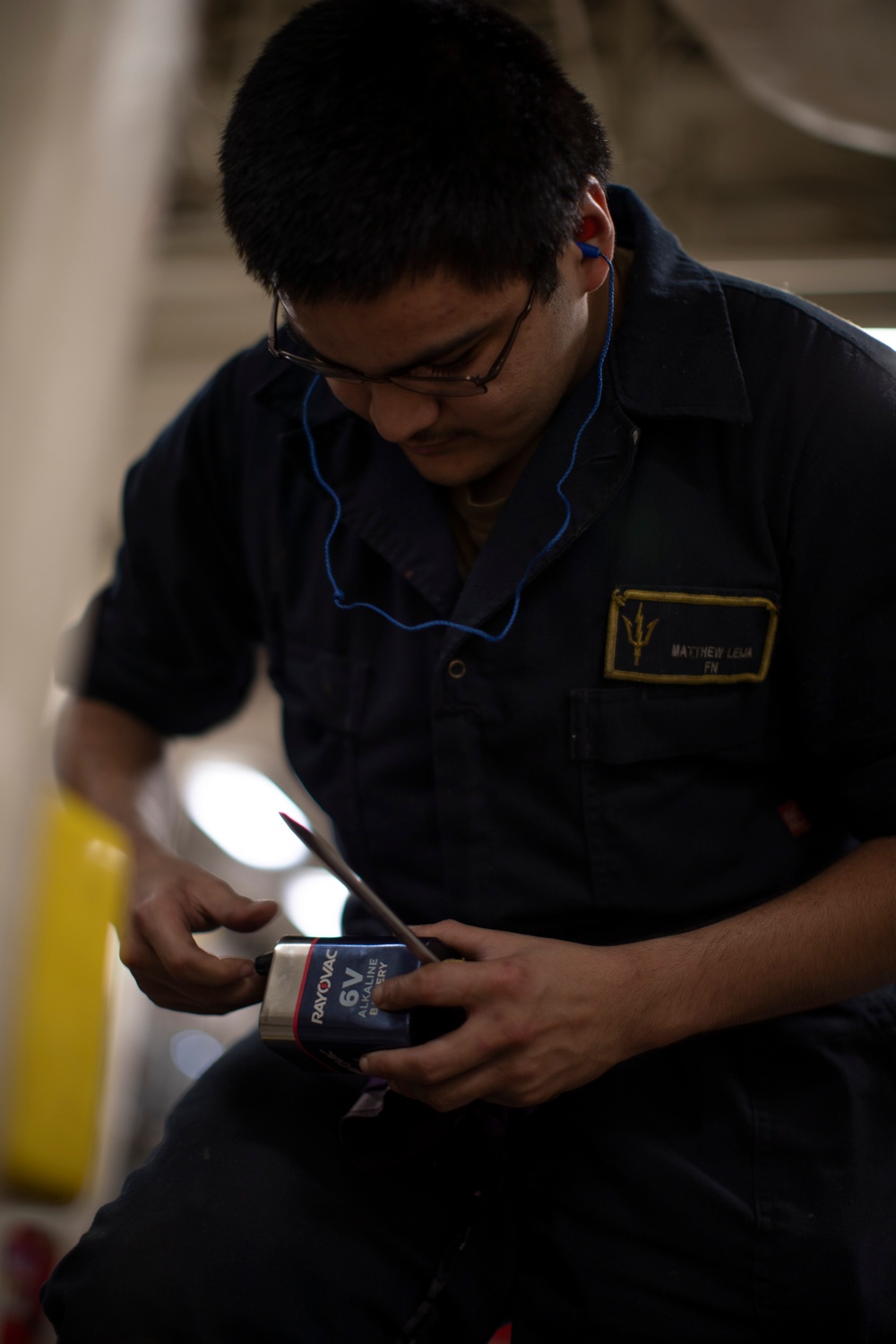 USS Tripoli Sailors Perform Maintenance