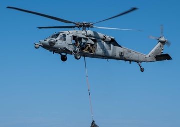 USS Dwight D. Eisenhower (CVN 69) Conducts a Replenishment-At-Sea in the Gulf of Oman