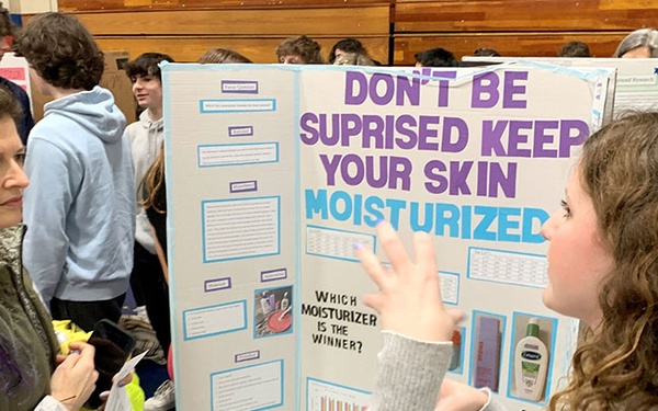 NUWC Division Newport employees guide STEM learning by judging science fairs