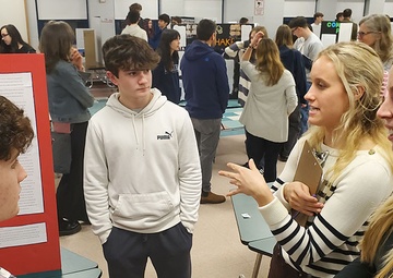 NUWC Division Newport employees guide STEM learning by judging science fairs