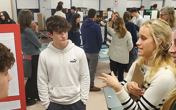NUWC Division Newport employees guide STEM learning by judging science fairs