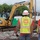U.S. Army Corps of Engineers quality assurance specialists observe debris removal