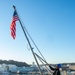 USS Ronald Reagan (CVN 76) Sailors conduct morning colors