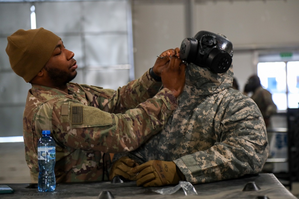 Soldiers at Karliki practice chemical attack response