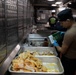 USS Bataan Sailors Cook in Galley