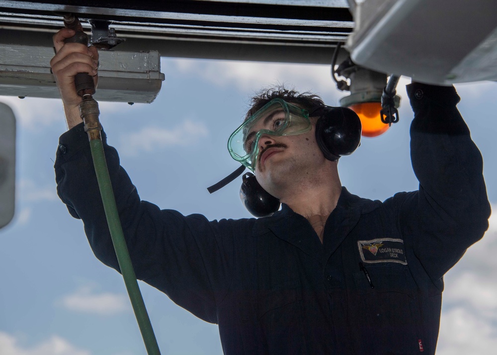 USS Carl Vinson (CVN 70) Sailor Conducts Maintenance