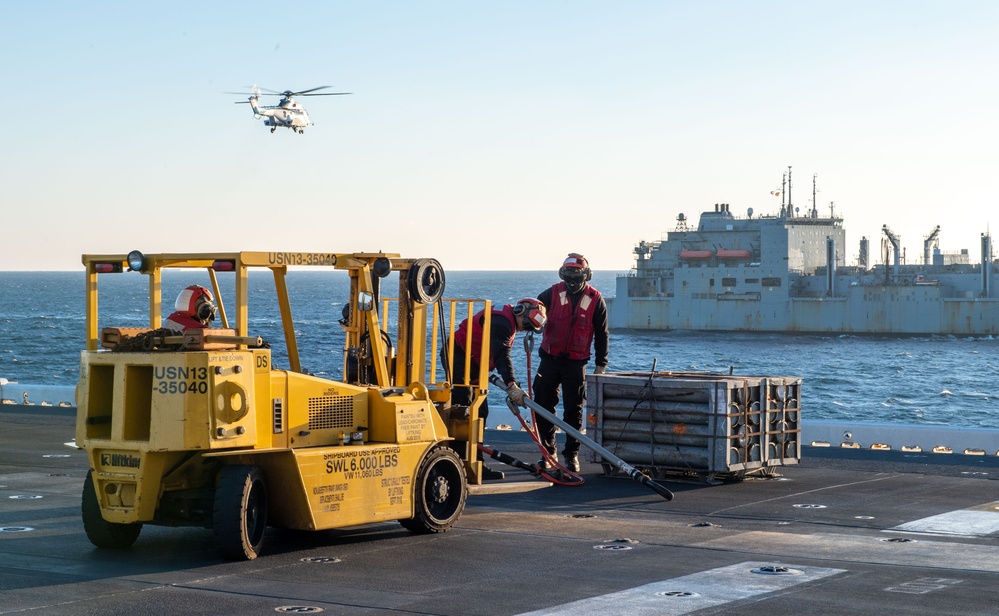 USS America Conduct a Vertical Replenishment Operation with USNS Charles Drew (T-AKE-10)