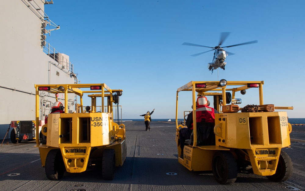 USS America Conducts a Vertical Replenishment Operation with USNS Charles Drew (T-AKE-10)