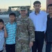 Lt. Col. Hun with his children during promotion ceremony.