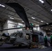 Sailors perform maintenance on MH-60S Seahawk