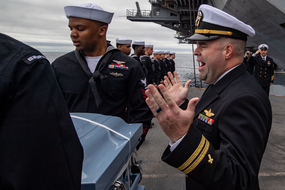 Abraham Lincoln hosts a burial-at-sea ceremony