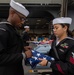 Abraham Lincoln hosts a burial-at-sea ceremony