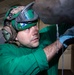 USS Carl Vinson (CVN 70) Sailor Conducts Maintenance