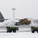 Snowplows clear the flight line at MAFB