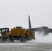 Snowplows clear the flight line at MAFB