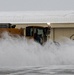 Snowplows clear the flight line at MAFB