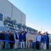 Employees of USACE, SFWMD and stakeholders hold the new plaque for the C-43 Reservoir pump station