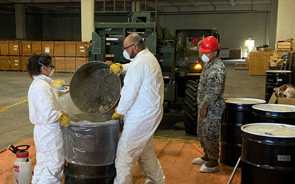 JMC rep oversees packaging of contaminated soil in Japan