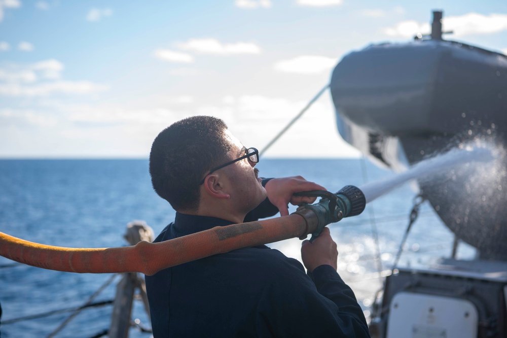 USS Kidd (DDG 100) Sailors Participate in Freshwater Wash Down