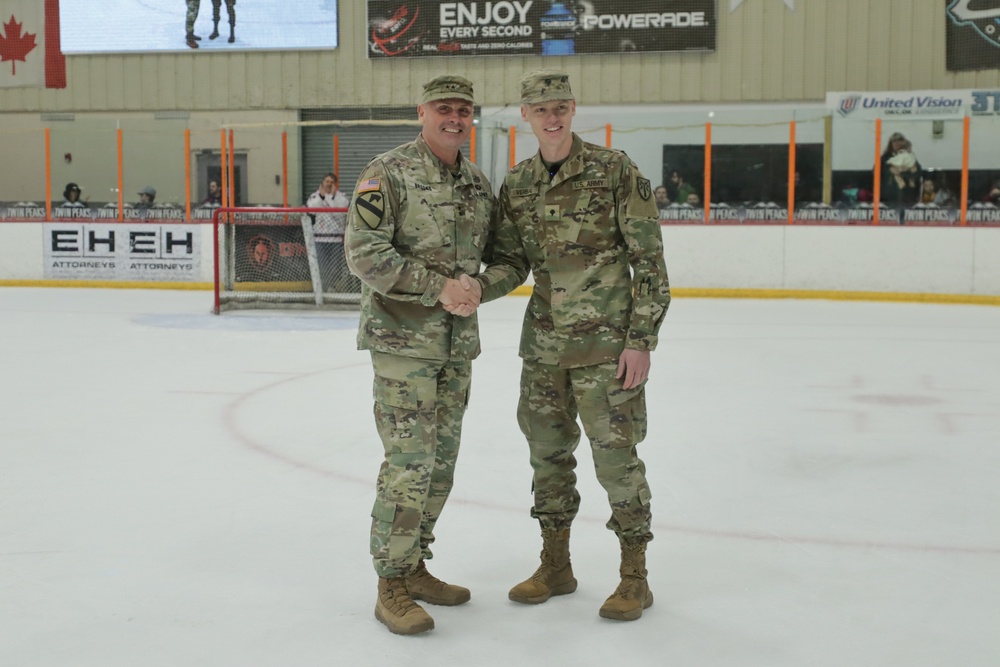 Commanding General Reenlists Soldier On Ice