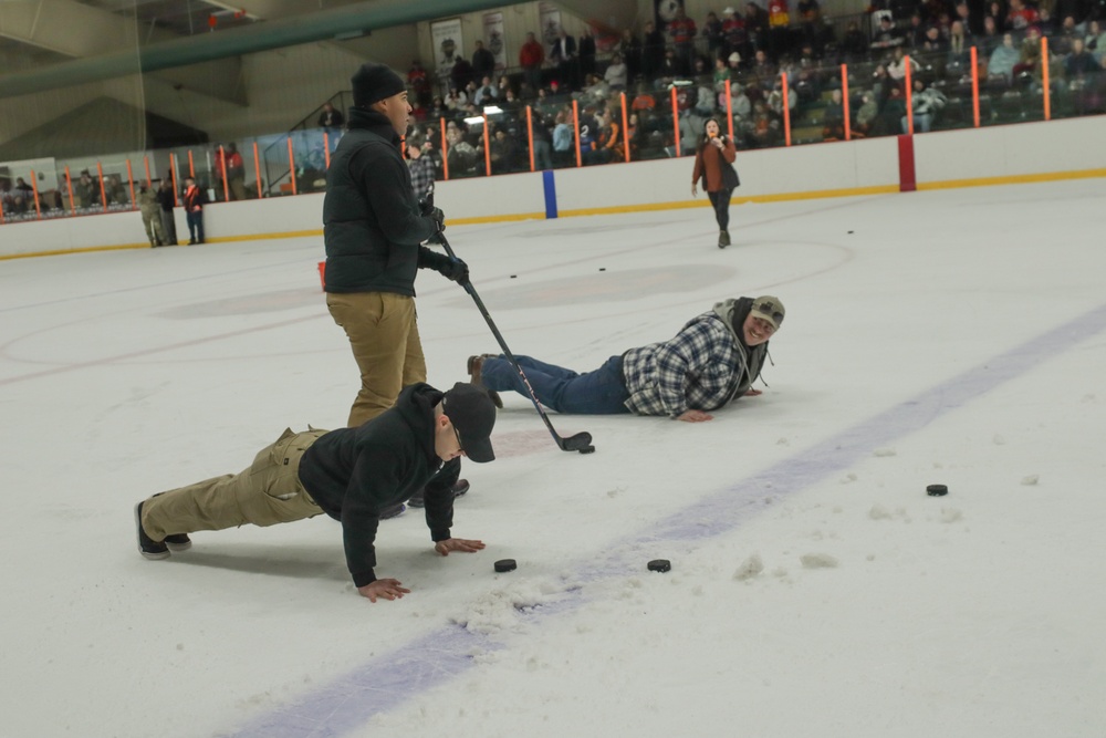 Commanding General Reenlists Soldier On Ice