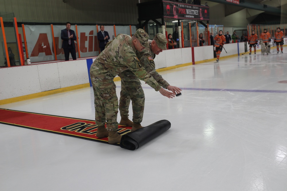 Commanding General Reenlists Soldier On Ice