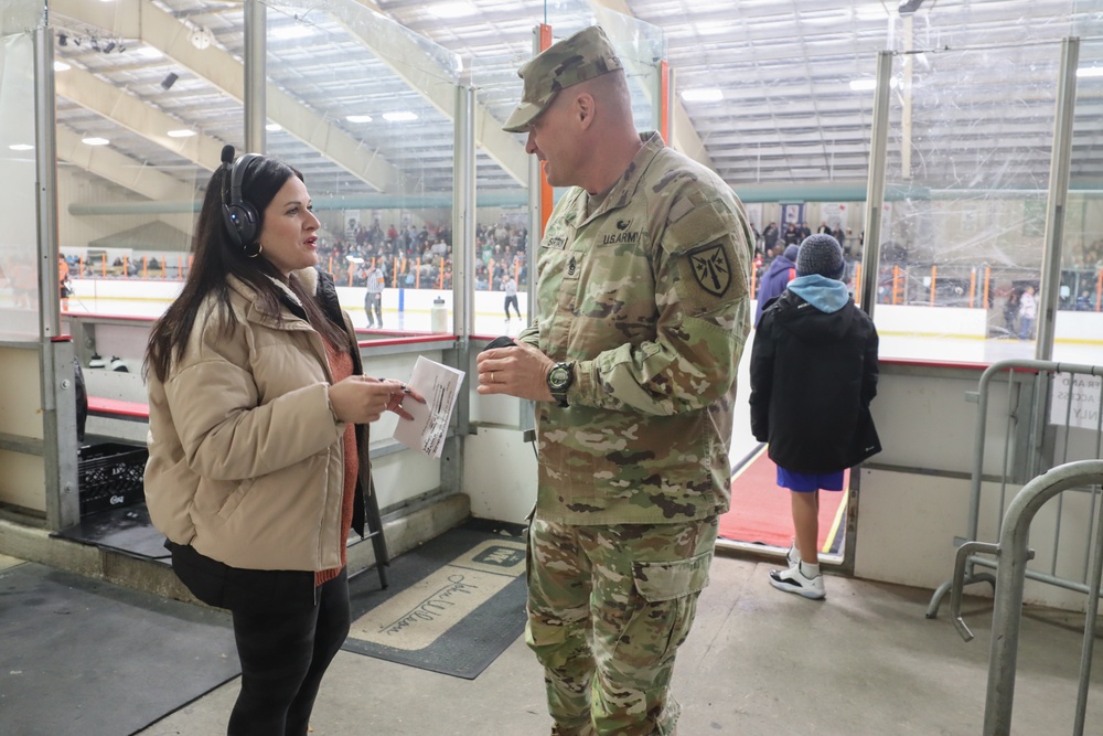 Commanding General Reenlists Soldier On Ice