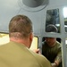 Maintainers replace aircraft window