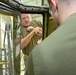 Maintainers replace aircraft window