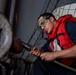 Sailor Removes Rust for Ship Preservation Aboard USS Carl Vinson (CVN 70)