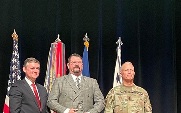 Deployed contracting civilian earns top recognition for security assistance work