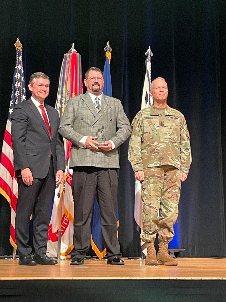 Deployed contracting civilian earns top recognition for security assistance work