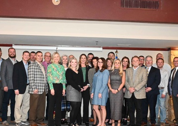 97 AMW leaders induct new honorary commanders