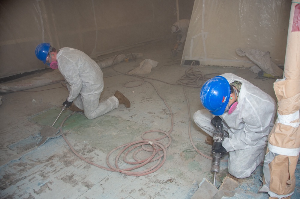 USS Ronald Reagan (CVN 76) Sailors conduct deck demolition