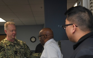 Rear Adm. Stu C. Satterwhite, Commander, MyNavy Career Center (MNCC), speaks with RSC workers during a scheduled visit to SUBASE, Jan. 24, 2023