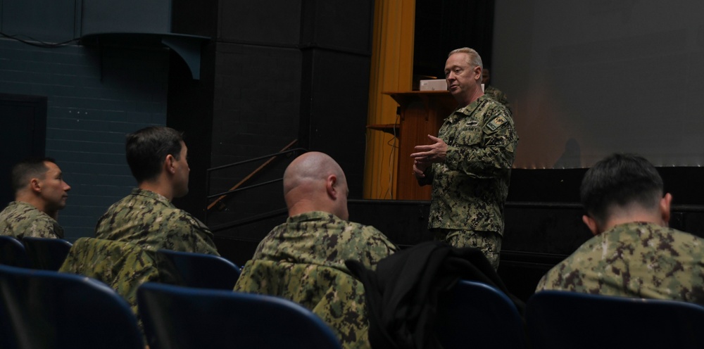 Rear Adm. Stu C. Satterwhite, Commander, MyNavy Career Center (MNCC), speaks with command leadership in Dealey Center Theatre during a scheduled visit to SUBASE, Jan. 24, 2023